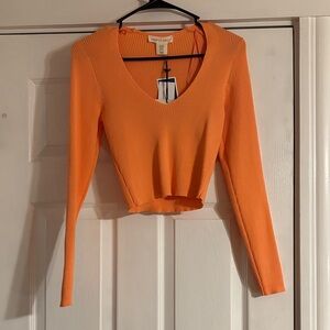 Vibrant Orange V-Neck Crop Top